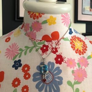 Enamel painted “B” charm on silver chain